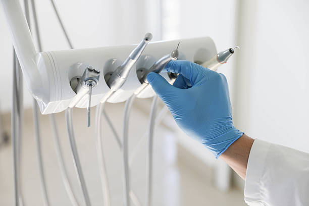 Professional Tooth Extraction technician working in Laurel, FL